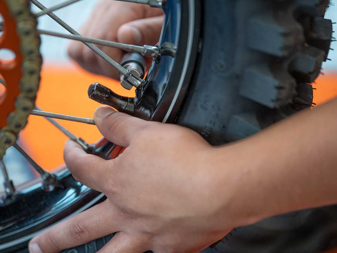 Tightening spokes on a outlet bicycle