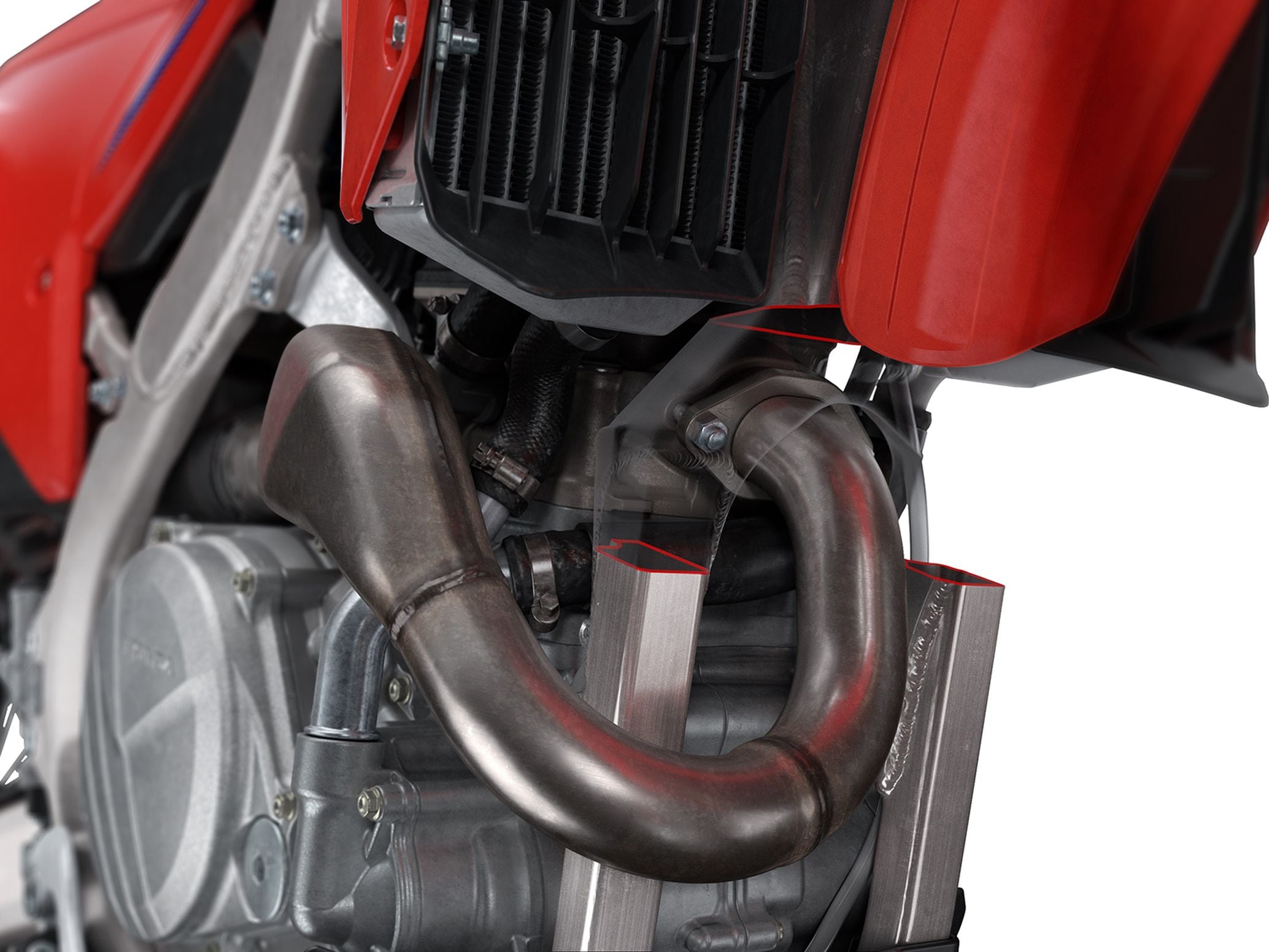 With the new frame’s cradle extending higher toward the downtube, Honda was able to route the header pipe through the front of the frame as opposed to the side, like on the prior generation model.